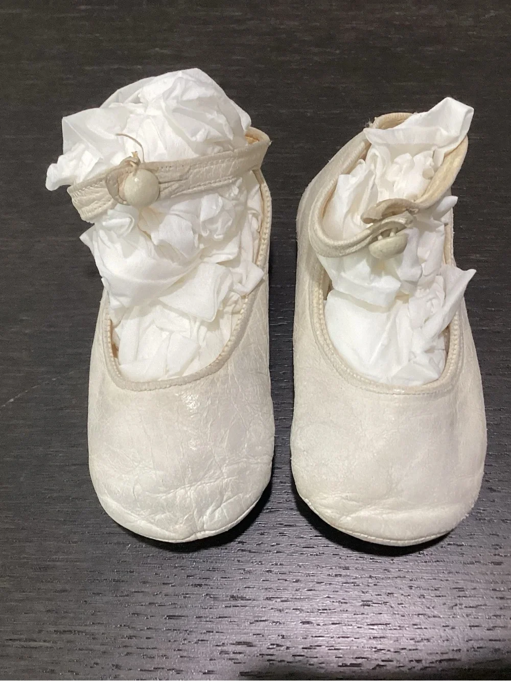 Antique white fine thin leather appropriate for baby shoes.  Likely from the lat